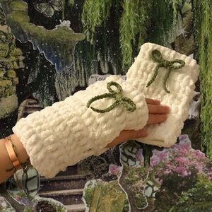 Handmade crochet white fingerless gloves with green bow